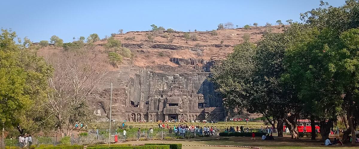 Built during 600 to 1000 CE, Ellora Caves lie in the Sahyadri hills in Aurangabad and is a 2-hour drive from the Ajanta Caves. The Ellora Caves comprise Hindu, Buddhist and Jain temples and over a 100 caves with only 34 open to the public excavated from the basalt cliffs in the Charanandari hills. Ellora Caves served as lodgings to the travelling Buddhist and Jain monks besides being a site for the trade route. There are 17 Hindu caves, 12 Buddhist and five Jain caves with deities, carvings and even monasteries depicting the mythology of each religion.