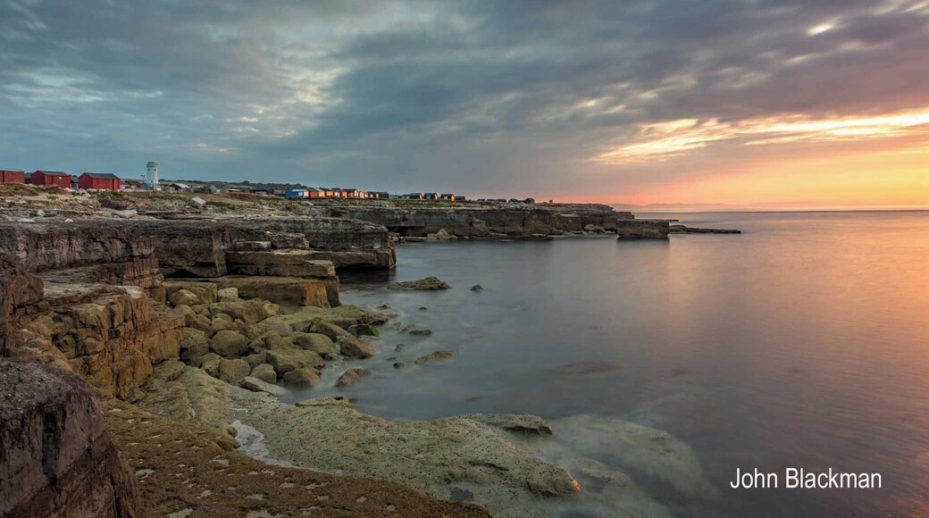 Turn away from Portland Bill lighthouse and this is the view. The beach huts are arguably an eyesore but at least have caught the early morning light.