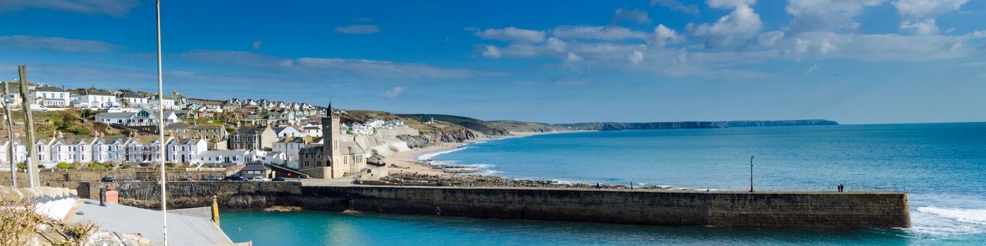 Porthleven is a picturesque Cornish fishing village, located on the south coast 10 mins from Helston (by car). This is a great place to stay for a few days, there's loads to do, lots of great food & beer and some fantastic photograph locations. Porthleven has plenty of accommodation but booking early is essential, there is also a campsite 5mins walk from the village centre. There are loads of great restaurants & pubs with a plentiful supply of coffee shops, not forgetting the 'Horse & Jockey' pasty shop, a beef skirt rough puff pasty is my favourite, especially washed down with a pint of 'Proper Job' from the Harbour Inn. One of my favourite places to eat would have to be the 'Ship Inn', really very good food, lovely sea food and some good vegetarian options also. Roaring log fire in winter for those cold drizzly days. Places to photograph - The Clock Tower is probably the most famous landmark to take an image of, especially during a S.W. Storm, waves frequently reach the top of the tower, how it's still standing pays testament to its builders (they don't build them like that these days). At the end of the pier is good for surfers out on the reef, you'll need a long lens at least 400mm. Between Porthleven and Helston, there is a National Trust area called 'Penrose Estate', this is a great place to walk, it has forest, open pasture, beach front and lakeside views (I'll be posting a separate description about Penrose) at a later date. One thing to note - During the English school summer holidays, Porthleven can get extremely busy.