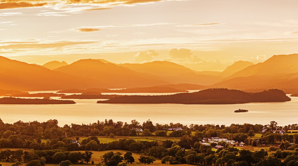 Panoramic view of Loch Lomond (the largest inland stretch of water in Great Britain) at Sunset. Loch Lomond and The Trossachs National Park, Scotland, UK