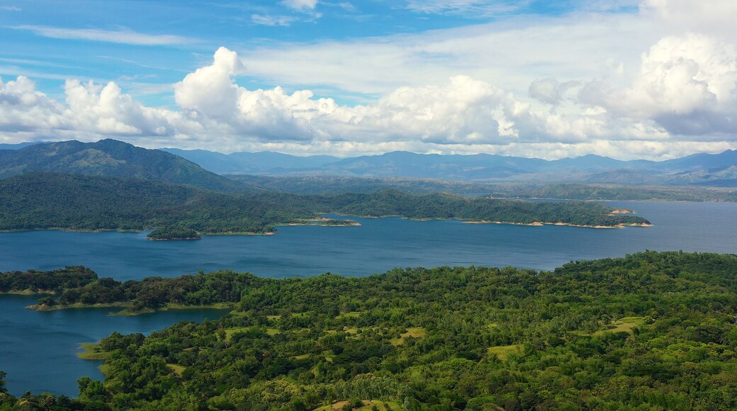 Landscape with beautiful lake against blue sky and clouds.Mountain landscape in the tropics. Pantabangan lake, Philippines, Luzon.