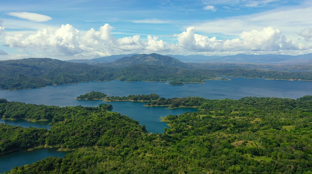Beautiful landscape with green hills, top view. Azure Pantabangan lake among the hills. Lake in the mountains. Philippines, Luzon.