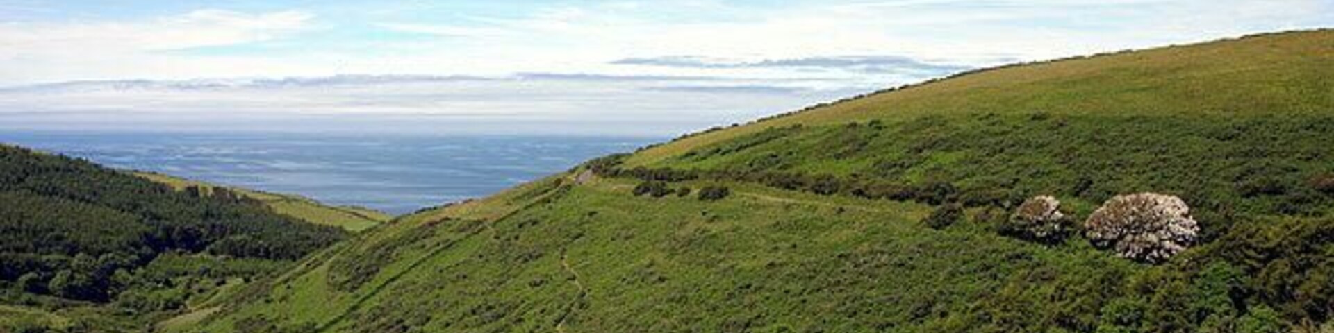 Lagg Valley and Irish Sea. Looking W from 229774. The main road (A27) is visible to the right.