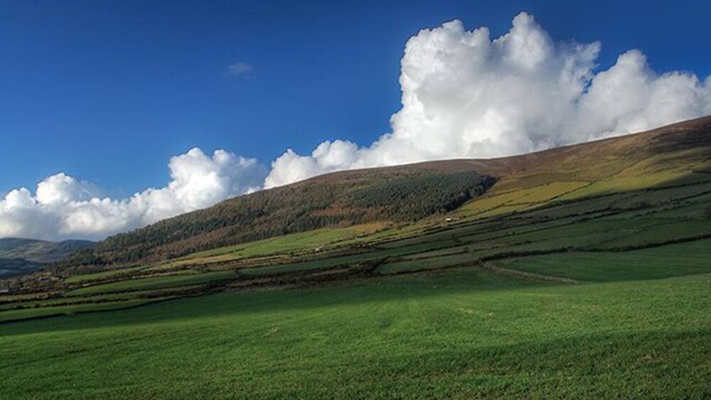 Fields above Crosby Greeba Mountain on the horizon.