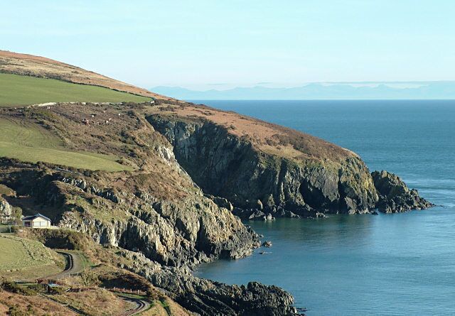 Groudle Headland - Isle of Man. Picture taken from the south side of Groudle Glen, with the mountains of the English Lake District visible on the horizon. The tracks of the Groudle Glen Railway can also be seen.