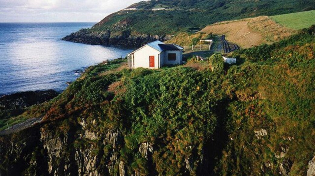 The end of the line at Sea Lion Cove From the old sea lion enclosure looking across the cliff to Sea Lion Cove station.
