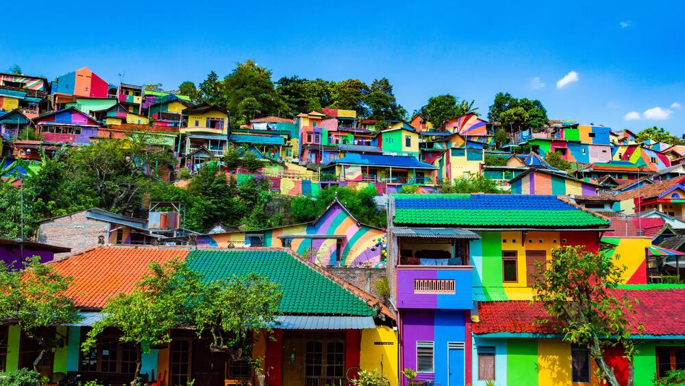 Semarang, Indonesia - 27th May 2017: Colorful houses in Kalisari Rainbow Village (Kampung Pelangi Kalisari) in Semarang, Indonesia. The writing translates to Rainbow Village Wonosari City