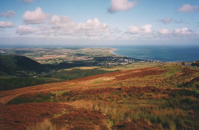 Moorland above Glen Auldyn From near the Guthrie's Memorial looking over Glen Auldyn to the north of the island. The A18 on the right leading down to Ramsey.