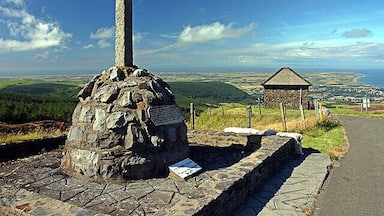Guthrie's Memorial. On the TT course, high above Ramsey (in the background).