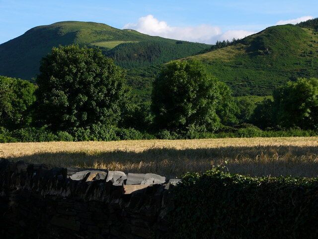 View south west from the Sulby Glen Hotel The hill on the left is Mount Karrin, that on the right Gob Y Volley