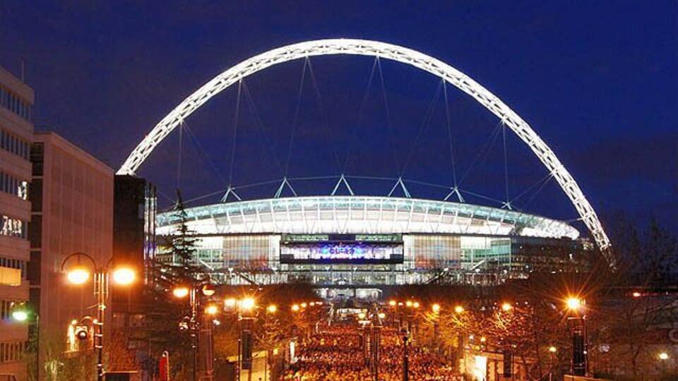 Wembley is the national stadium and home of the England football team. The new stadium has a arch which is illuminated at night. You are free to use this imagine providing you credit Landscapes of England and provide a link back to our website - www.landscapesofengland.co.uk