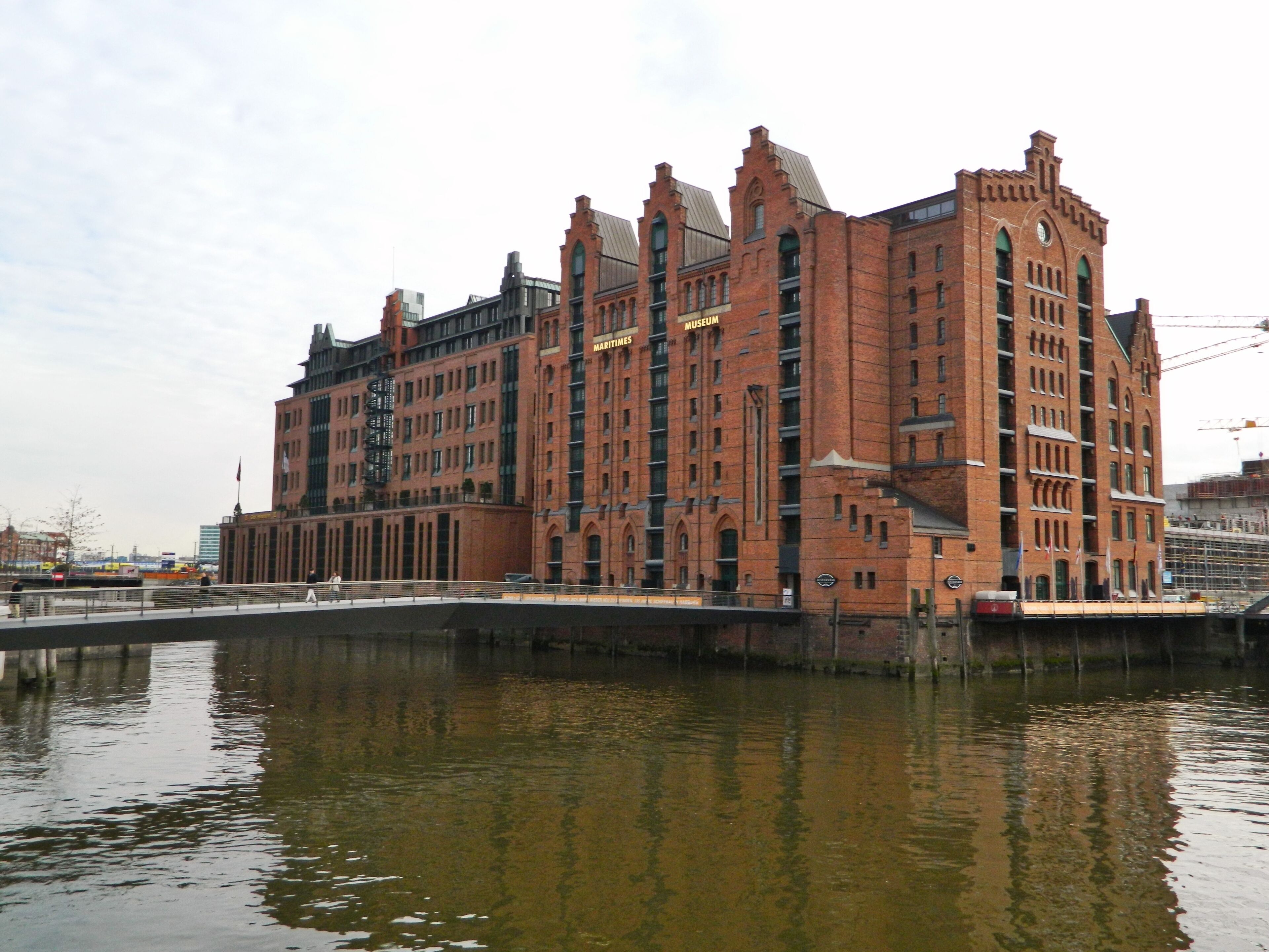 A large brick building with a sign reading "Maritime Museum" across the top.