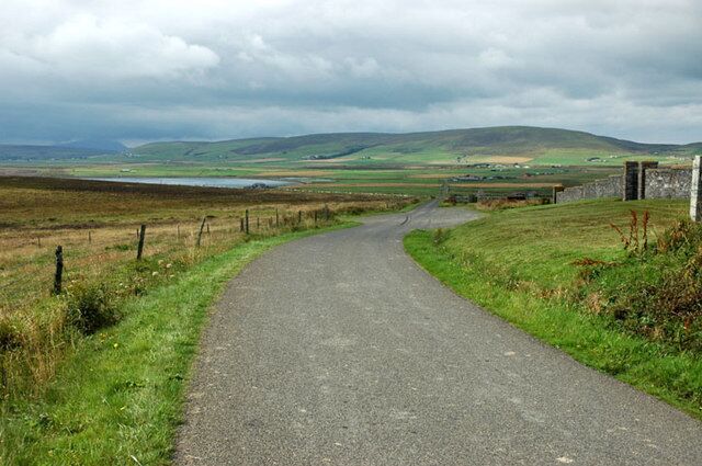 Gorseness road at the new Rendall Cemetery. The Bay of Isbister can be seen in the distance