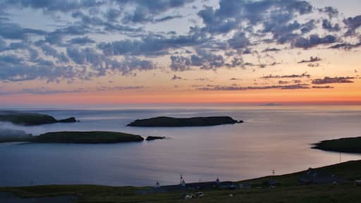 Looking out over the the small island of Colsa and distant Foula.
