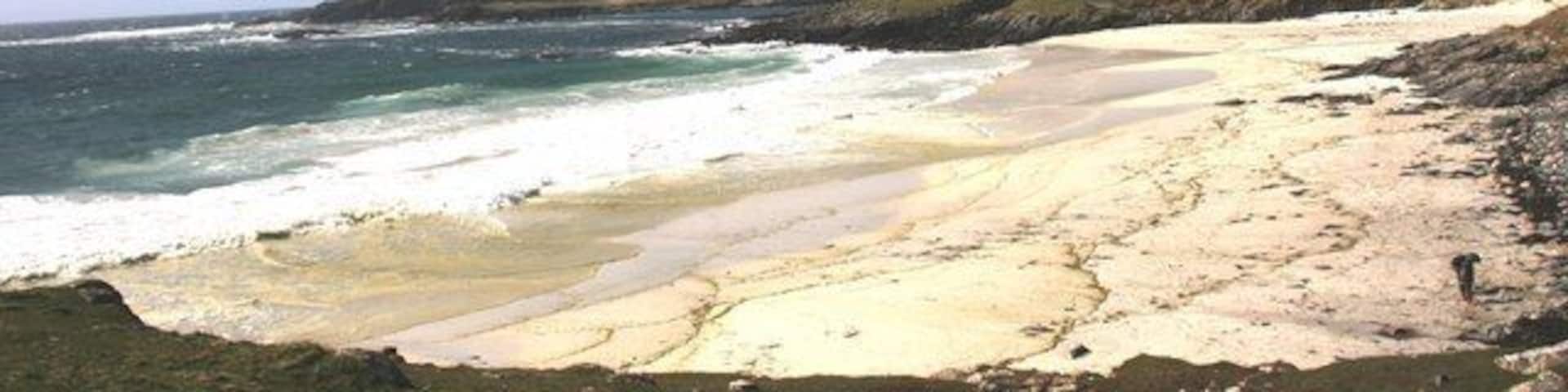 Meal Beach A sandy cove just south of Hamnavoe.