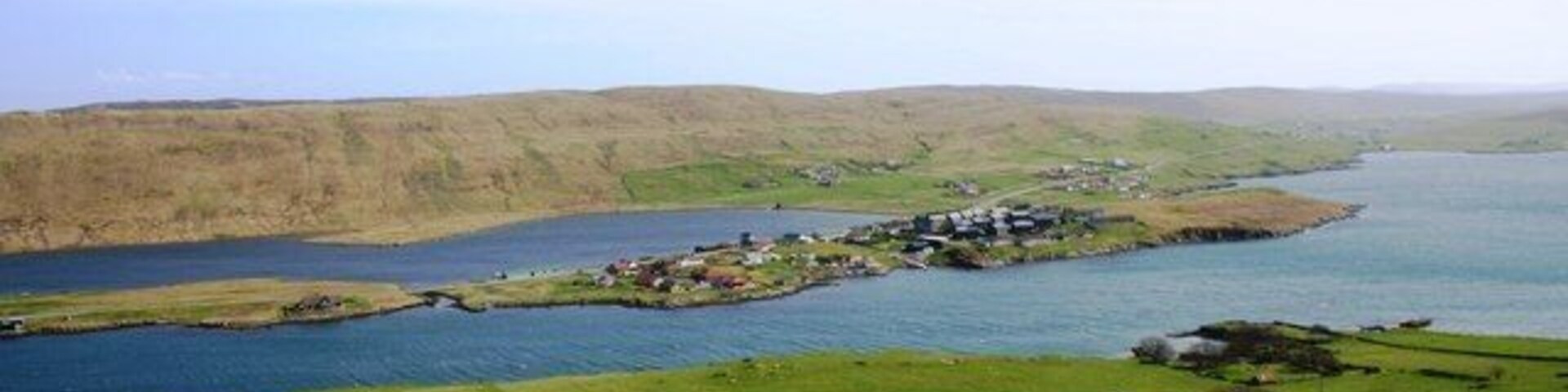 Hellister across Weisdale Voe The Loch of Hellister with Weisdale Voe in the foreground, the intersection f the two is crossed by the Kallie Bridge.