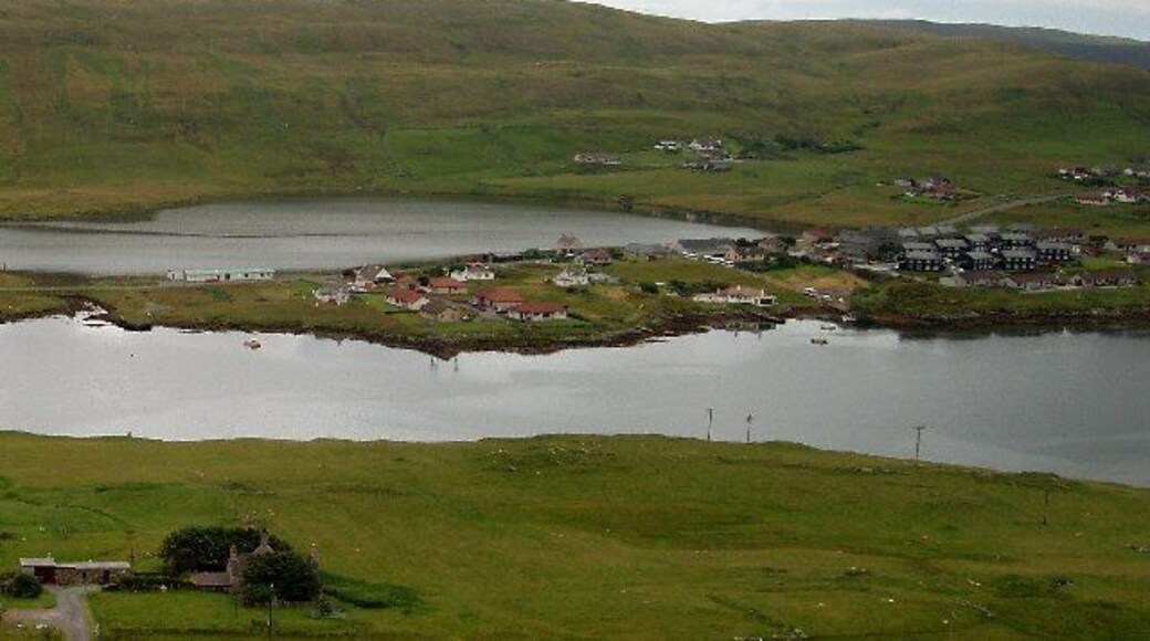 Kalliness. The village seen across the waters of Weisdale Voe