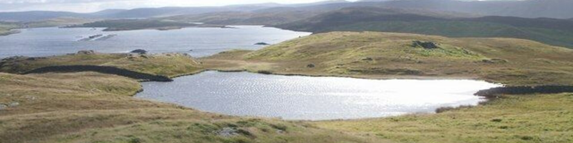 Loomi Shun Loomi Shun, Lunnasting, small lochan. Loomi meaning wild fowl and shun a small body of water.