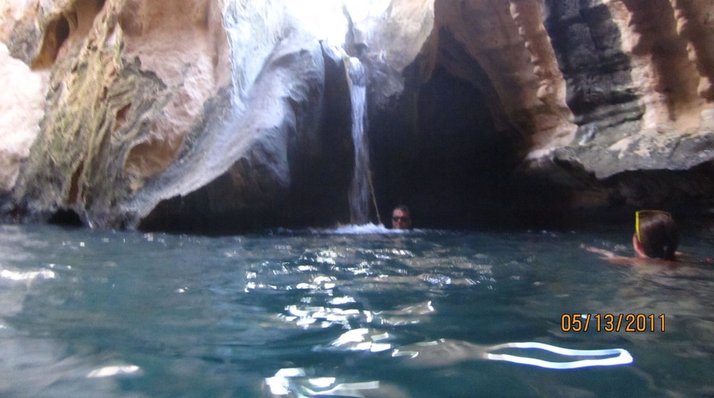 You must find someone to take you to a Wadi. Take water and food, you will hike for hours, but the views are amazing. Then at the top we swam through a small underwater passage and ended up inside this awesome waterfall cave! One of the best experiences ever. We were with friends living and teaching there but you should not go alone. When the tide from the ocean comes in, you will not be able to get back to your car. You must know what you are doing when you hike a wadi.
http://www.omantourism.gov.om/wps/portal/mot/tourism/oman/home/experiences/nature/valleys/!ut/p/a0/04_Sj9CPykssy0xPLMnMz0vMAfGjzOItvc1dg40MzAz8fZzMDTyDQz0Mg92djN2NjfULsh0VAUrMXXQ!/