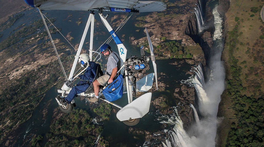 The so-called ‘flight of angels’ is undoubtedly the most breath-taking way to see the magnificent Victoria Falls in all their glory, and to get those picture postcard panoramic photos you have always dreamed of. This is also a great way to see the Zambezi River as it leads up to the Falls, as well as the formation of the spectacular gorges that are carved out below.
You can also take a microlight or a helicopter ride over the Falls. The extended flight covers not only the Falls but also Batoka Gorge, the Zambezi River and the Mosi-oa-Tunya National Park. There are wing-mounted cameras and a dvd of the pictures can be purchased after you land. The microlights can be booked for either 15 minute or 30 minute trips. This is the most personal way to view the Falls from the air, with just the qualified pilot and one client per aircraft.
All flights leave from Maramba Aerodrome in Livingstone and are at the Falls within about a minute.