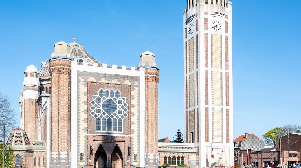 Saint Chrysolius and Saint Peter Church with the belfry tower at the old market square of Comines - Hauts De France