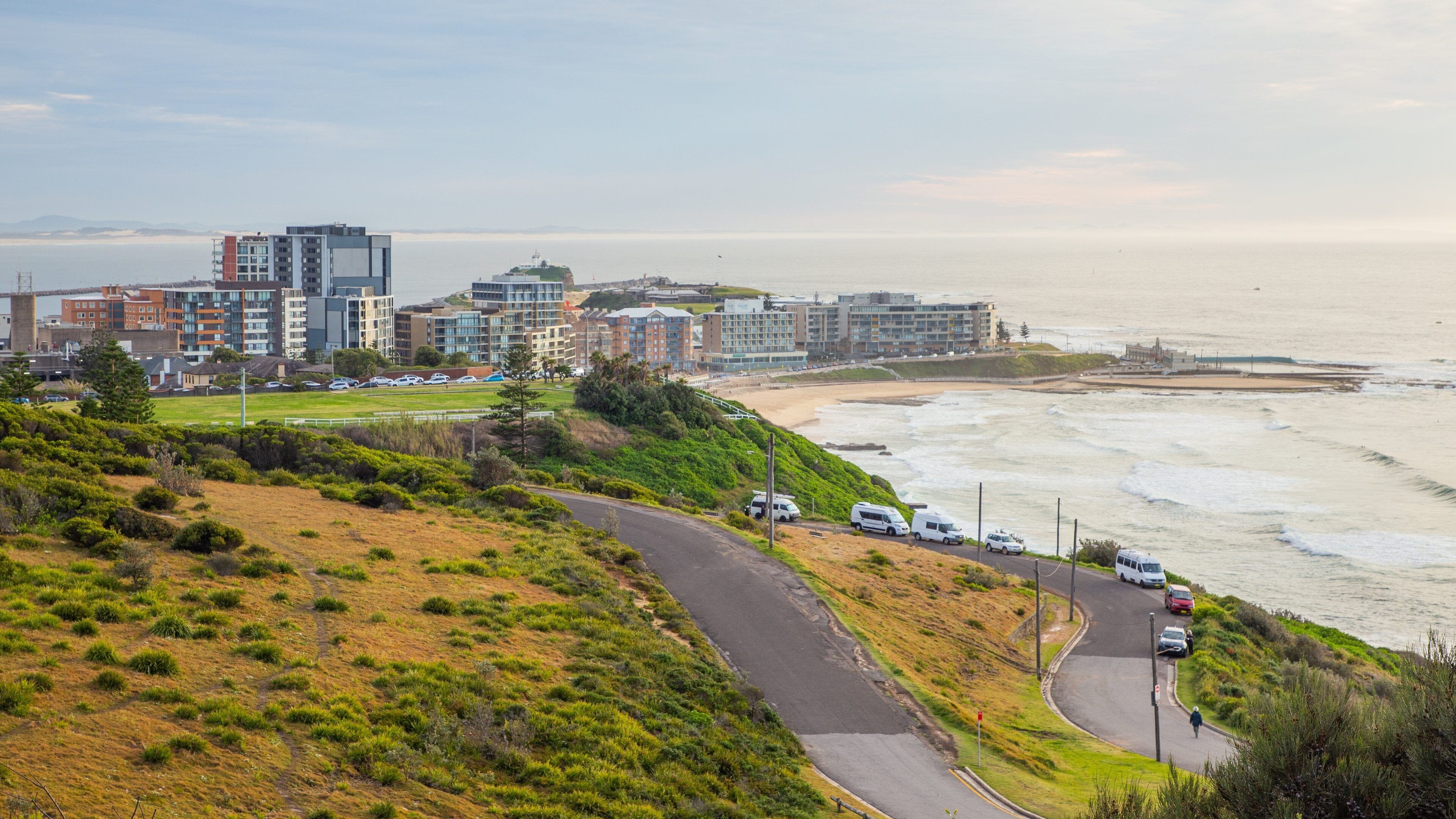 King Edward Park which includes a sunset, a coastal town and landscape views