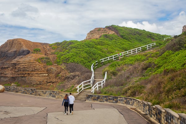 King Edward Park showing rugged coastline as well as a couple