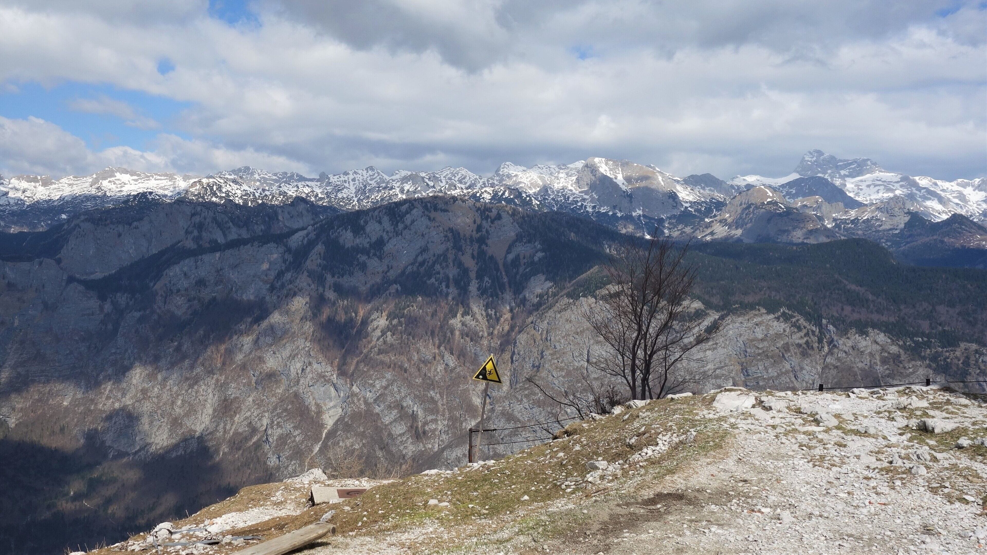 A landscape in layers: clouds, snowy peaks, the shadow of the clouds and a sunny foreground.  #GreatOutdoors  #Nature