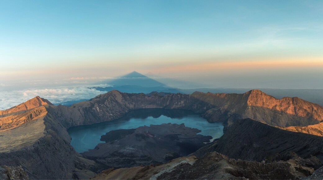 Hiking up Rinjani was hands down the hardest hike of my life! The early 2am climb up to the summit for sunrise was gruelling; however, the view from the top was an emotional one. Standing on the top of the tallest Volcano in Lombok and having friends to share the experience is something I'll never forget! Where else in the world can you find a shadow of the volcano you're standing on appear to be the next tallest volcano around?
