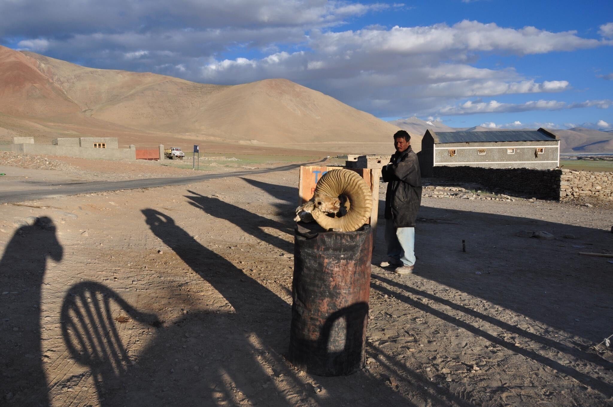 Our road trip from Srinagar to Ladakh and back to Delhi brought us to this mountain lake, perhaps the most desolate place I’ve seen.  The photo shows the sunset casting our long shadows, and I think it adds a spooky element to the shot.  #Adventure