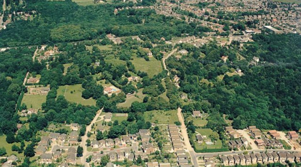 Aerial view of Coombe Wood and Thundersley Glen The London Road (A13) runs left to right across the image. Coombe Wood lies just above this at the left and Thundersley Glen below it on the right. Hill Road runs from mid-centre bottom up towards the centre. Thundersley Park Road runs from left of centre-bottom up and curves round to join Hill Road. These two roads are unmade at the centre of the image (though they are mad at the bottom). Underhill Road runs parallel to the bottom at the right. Thundersley proper occupies much of the upper right.