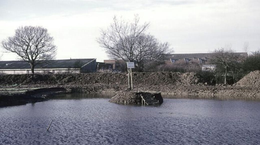Thundersley pond after filling. This was taken in early 1986, when the pond had filled, and settled down. Over the next few years, it became a fine wildlife pond with abundant dragonflies. 1514917 shows it before filling.