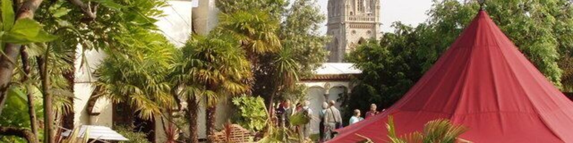 The Roof Gardens, Kensington High Street This is the Spanish Garden (see also 1971), part of the one and a half acre garden http://www.roofgardens.com/the_gardens/map/ above the sixth floor of the former Derry and Toms Department store. View to the spire of St Mary Abbotts. Visited when it participated in Open Garden Squares Weekend, but it is available for public visits when there is no private function.