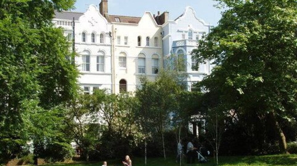 Lansdowne and Elgin Crescent Gardens Communal garden with local adults relaxing and children playing. Participating in Open Squares Weekend when this photo was taken.