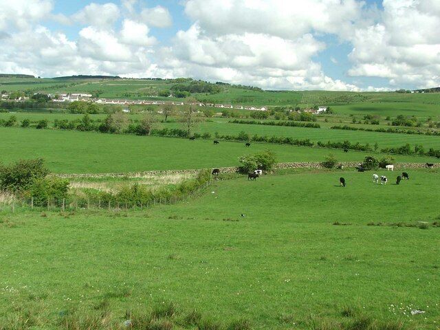 Looking across the Upper Nith Valley. The River Nith flows from left to right in the middle distance.