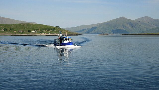 The Lismore ferry arriving at Port Appin jetty 'The Lismore' is a small boat operating a passenger ferry service between Port Appin on the mainland and the northeast end of the island of Lismore.