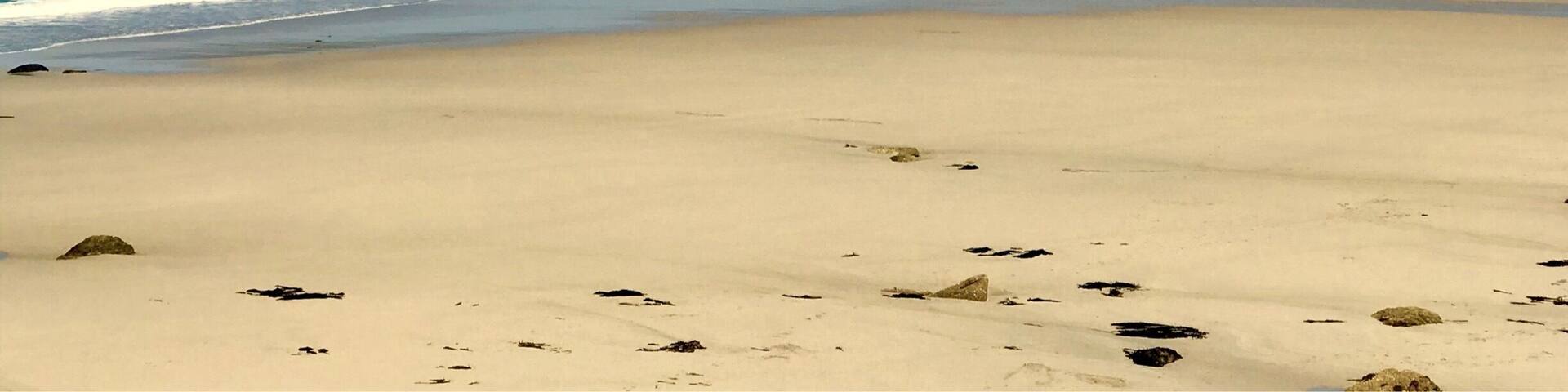 If your looking for a beautiful beach away from the crowds head to Sennen Cove Cornwall Uk.