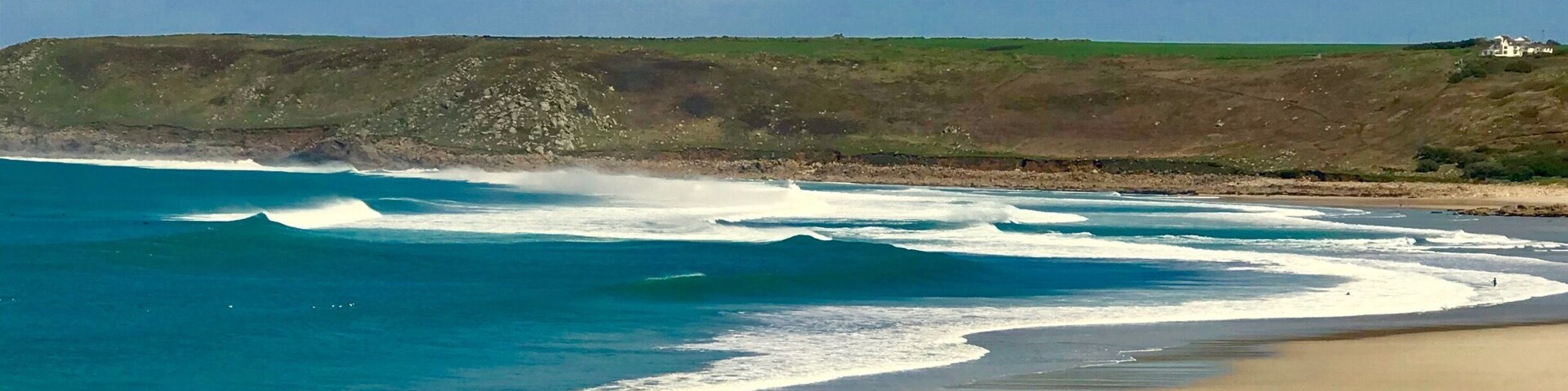 If your looking for a beautiful beach away from the crowds head to Sennen Cove Cornwall Uk.