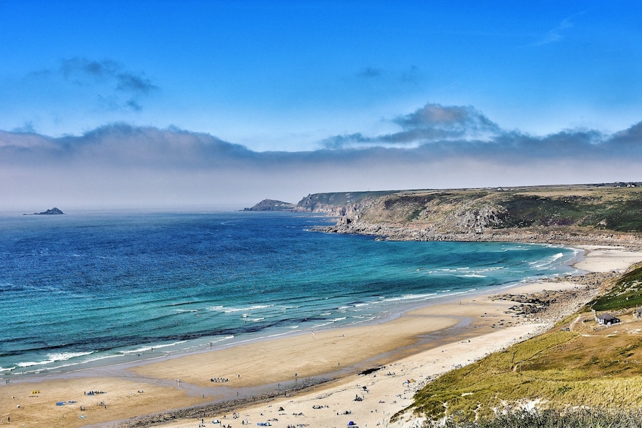 Watching the sea mist roll in.
Sennen Cove Beach in Cornwall UK. This is Cornwalls most westerly surfing hotspot with a mile long beach and the nearest to Land’s End.