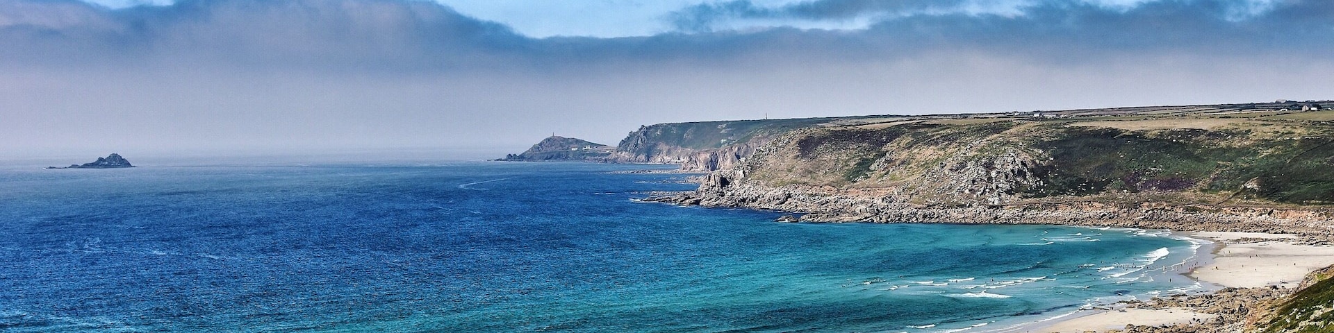 Watching the sea mist roll in.
Sennen Cove Beach in Cornwall UK. This is Cornwalls most westerly surfing hotspot with a mile long beach and the nearest to Land’s End.