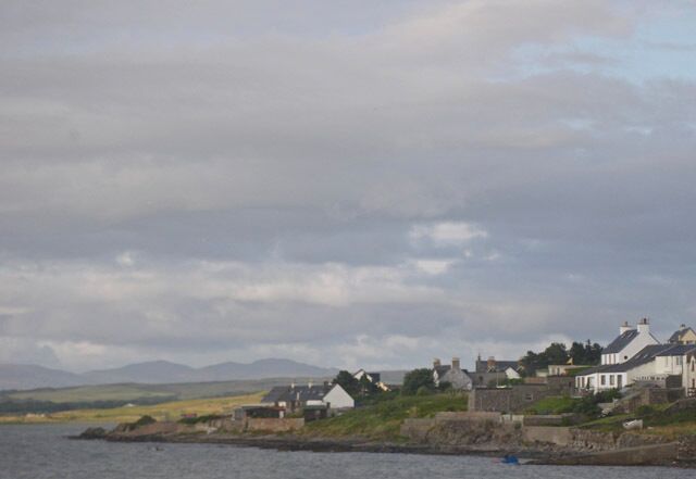 Shoreline north of central Bog Mor This is chiefly a residential area of single family homes on the northern shoreline of Bogh Mor; the waters are those of Loch Indaal.