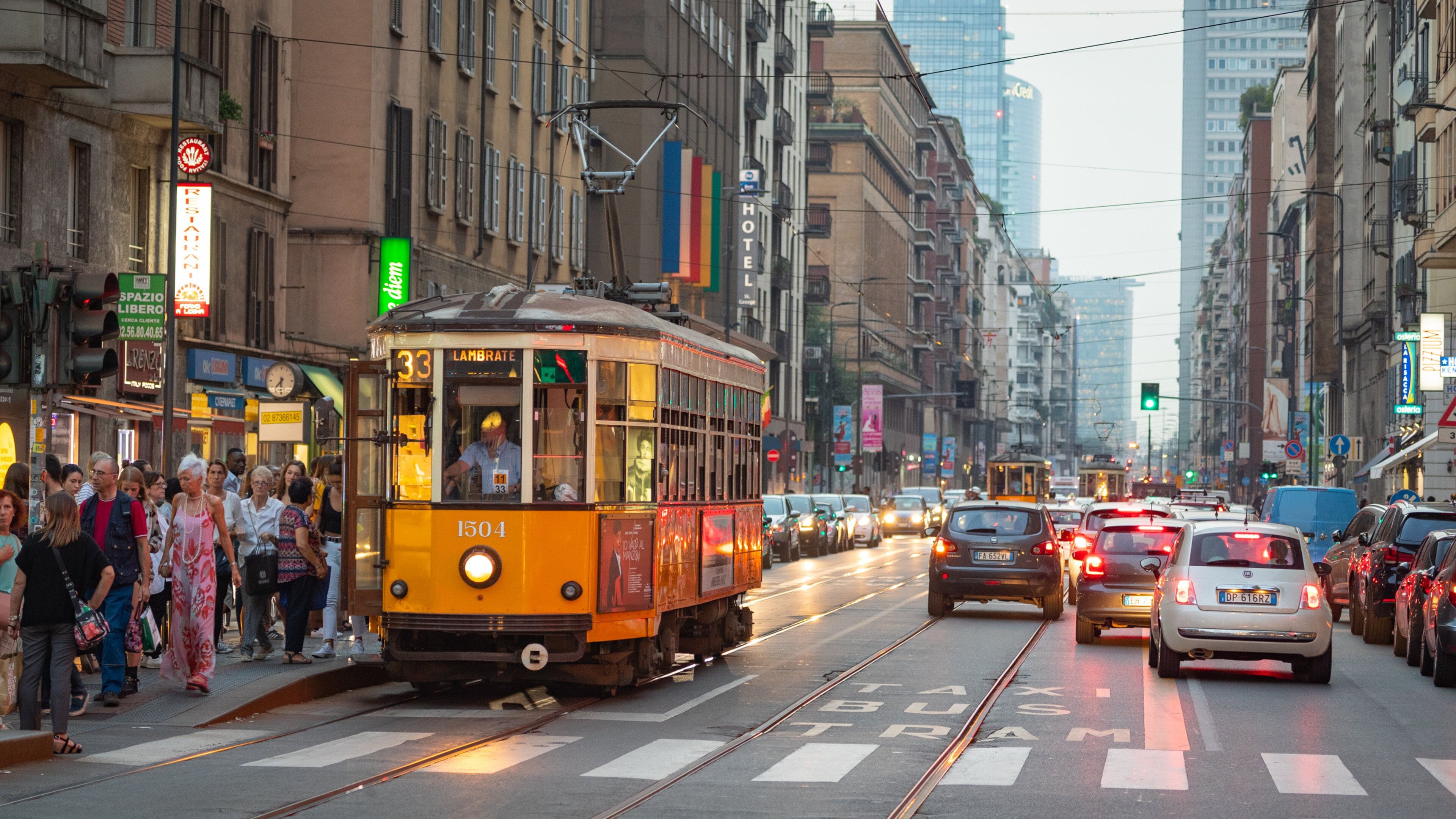 Porta Venezia featuring a city, railway items and street scenes