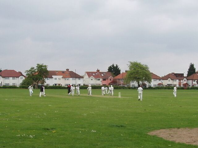 Sunday cricket, North Acton Recreation Ground. One of three cricket matches in progress on these playing fields.