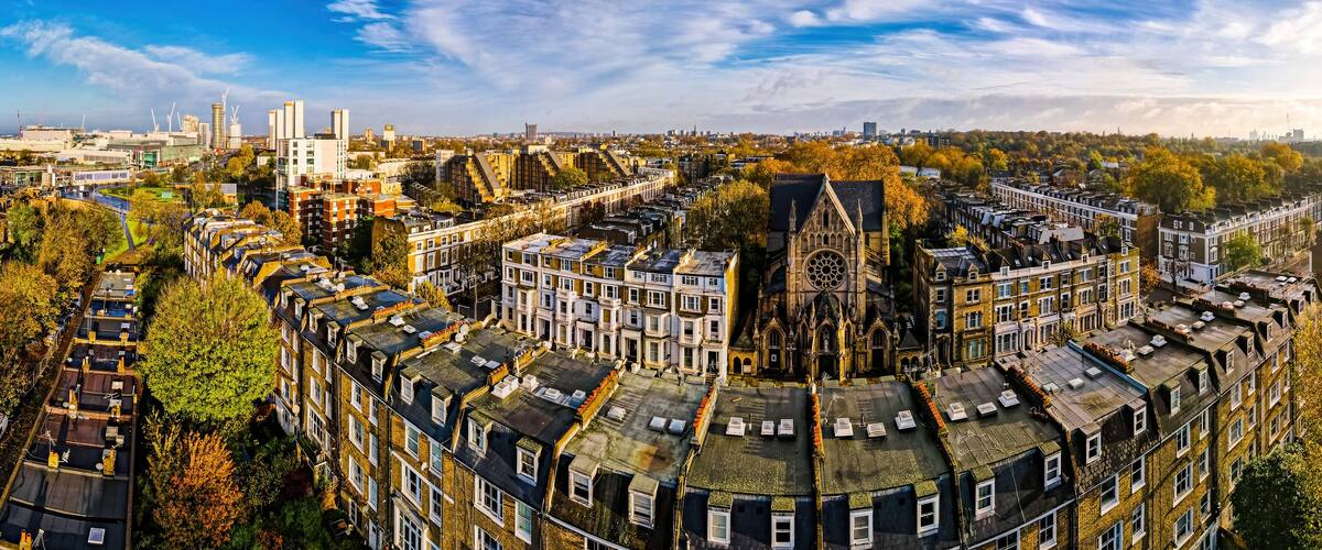 Aerial view of church and residential area in West London in autumn, England