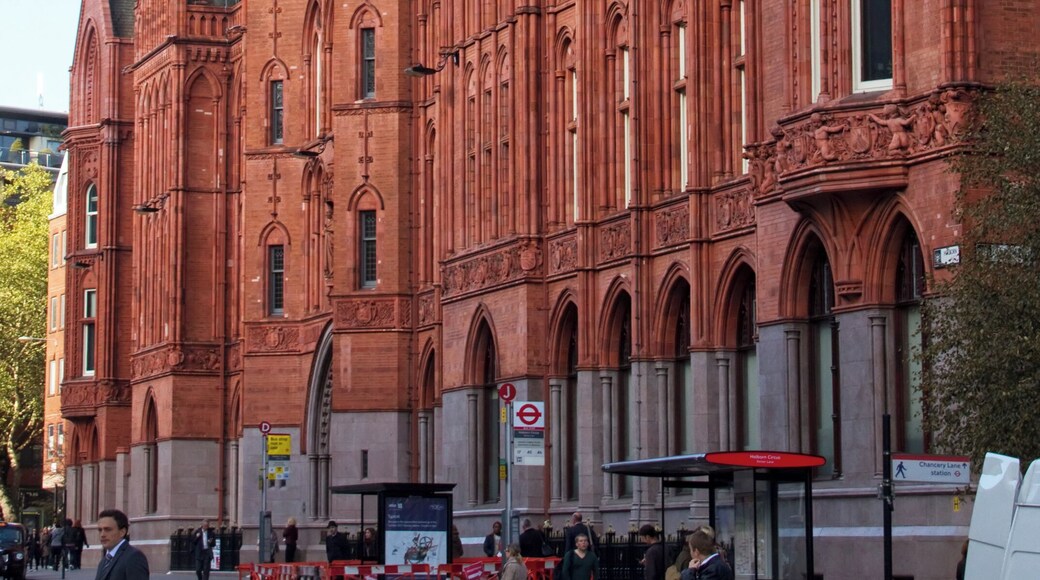 Gothic Revival style office block. Built 1885-1901 in several phases, by Alfred Waterhouse assisted by his son Paul.