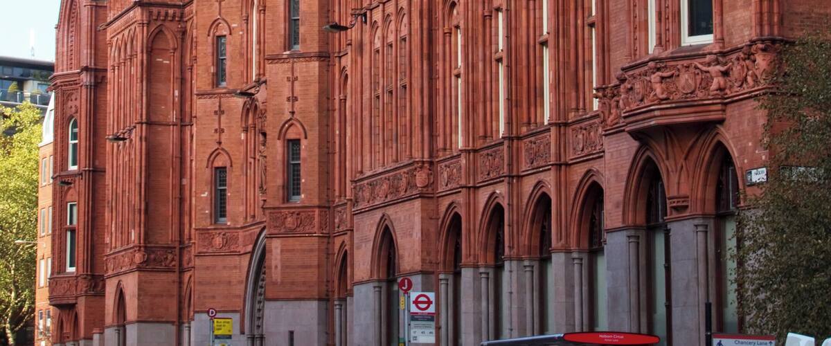 Gothic Revival style office block. Built 1885-1901 in several phases, by Alfred Waterhouse assisted by his son Paul.