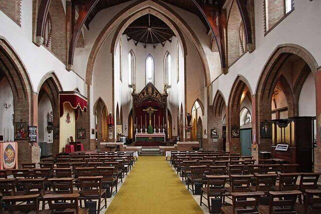 Church of England parish church of St Silas the Martyr, Kentish Town, London NW5: interior of nave, looking east towards apsidal chancel.