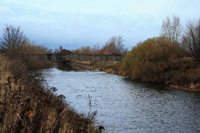 A Pipe Bridge Over the Derwent With the tower of Derby Cathedral in the distance.