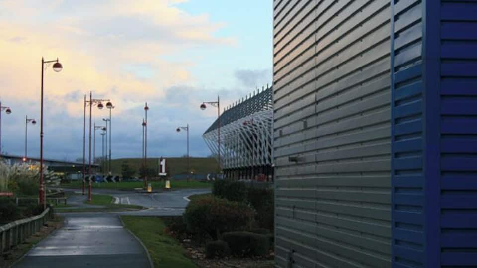 Pride Park The stadium peeps from behind a business unit on Millennium Way.