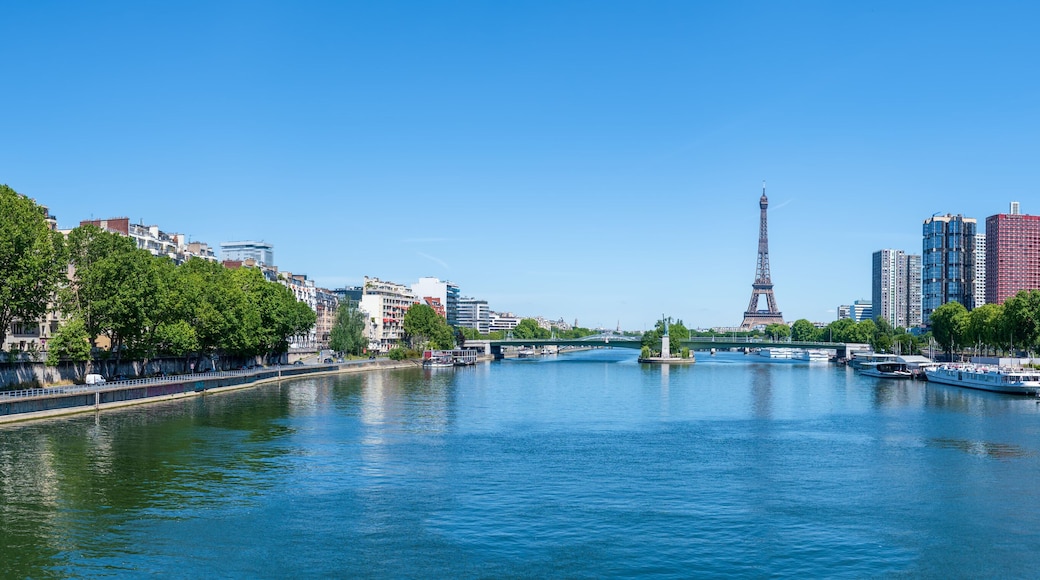 Panoramic of Eiffel Tower, Seine river and Statue of Liberty in Paris, France.